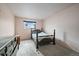 Bright bedroom with a sunny window view, creating a peaceful and comfortable space for rest and relaxation at 7917 Chase Cir # 160, Arvada, CO 80003