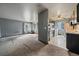 Open layout connecting the living area to the kitchen, offering great flow and potential for modern updates at 7917 Chase Cir # 160, Arvada, CO 80003