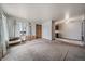 Open-concept living space offering a seamless transition to the kitchen area, with great potential for modern updates at 7917 Chase Cir # 160, Arvada, CO 80003