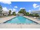 Community pool with lounge chairs at 7917 Chase Cir # 160, Arvada, CO 80003