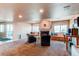 Inviting basement with a fireplace, built-in benches, and ample seating at 22261 Pebble Brook Ln, Parker, CO 80138