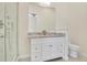 Clean bathroom with granite countertop and walk-in shower at 5585 Country Club Dr, Larkspur, CO 80118