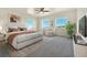 Main bedroom with views and neutral decor at 5585 Country Club Dr, Larkspur, CO 80118