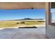 Covered patio with mountain views at 5585 Country Club Dr, Larkspur, CO 80118