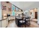 Stylish kitchen features updated appliances, an island with seating, and abundant storage at 4856 Cheyenne Dr, Larkspur, CO 80118