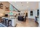 Updated kitchen with a center island, modern appliances, and hardwood floors at 4856 Cheyenne Dr, Larkspur, CO 80118