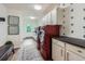 A spacious laundry room featuring modern machines, ample storage, and stylish decor at 4856 Cheyenne Dr, Larkspur, CO 80118