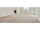 Cozy bedroom with neutral carpet, a closet, and a window offering outside views at 4858 Astor Pl, Brighton, CO 80601