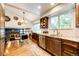 Bright kitchen with granite countertops, stainless steel appliances, and hardwood flooring at 9846 Spring Hill Ln, Highlands Ranch, CO 80129
