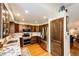Well-equipped kitchen featuring stainless steel appliances, granite countertops, and ample cabinet space at 9846 Spring Hill Ln, Highlands Ranch, CO 80129
