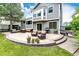 Relax on this large backyard stamped concrete patio with comfortable outdoor seating at 9846 Spring Hill Ln, Highlands Ranch, CO 80129
