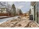 Spacious backyard patio with fire pit and grill at 7395 Slate Ct, Castle Rock, CO 80108