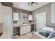 Bright laundry room with washer, dryer, and utility sink at 7395 Slate Ct, Castle Rock, CO 80108