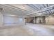 Unfinished basement space with exposed ceiling and concrete flooring, offering potential for customization at 14136 Bunny Hop Ln, Parker, CO 80134