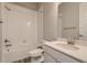 Bathroom featuring a shower-tub combo, modern sink, and neutral finishes at 14136 Bunny Hop Ln, Parker, CO 80134