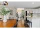 Open floor plan with easy access to the kitchen and featuring hardwood floors and modern design at 2763 Dharma Ave, Broomfield, CO 80020