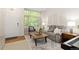 Bright and inviting living room with a large window, comfortable seating, and stylish decor at 2763 Dharma Ave, Broomfield, CO 80020