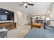 Open-concept living area seamlessly connects to the dining and kitchen, creating an ideal space for modern living at 2763 Dharma Ave, Broomfield, CO 80020