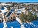 Aerial view of houses and neighborhood at 671 Stafford Cir, Castle Rock, CO 80104