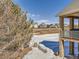 Partial view of backyard and neighborhood at 671 Stafford Cir, Castle Rock, CO 80104