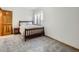 Finished basement bedroom with carpet and window at 671 Stafford Cir, Castle Rock, CO 80104