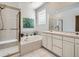 Bathroom features a soaking tub, double vanity, and walk-in shower at 671 Stafford Cir, Castle Rock, CO 80104