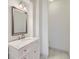 Elegant bathroom with marble vanity and a separate toilet area at 671 Stafford Cir, Castle Rock, CO 80104