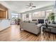 Spacious living room with hardwood floors, fireplace and large windows at 671 Stafford Cir, Castle Rock, CO 80104