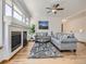 Comfortable living room with hardwood floors, fireplace and ample seating at 671 Stafford Cir, Castle Rock, CO 80104