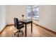 Home office with hardwood floors and a window view at 671 Stafford Cir, Castle Rock, CO 80104