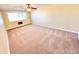 Spacious bedroom with neutral carpeting and large window at 9335 E Center Ave # 8B, Denver, CO 80247