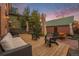 Relaxing backyard with a wooden deck and outdoor furniture, perfect for entertaining at 2841 N Franklin St, Denver, CO 80205