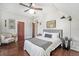 Bedroom with rich hardwood floors, comfortable seating, and stylish decor for a relaxing retreat at 2841 N Franklin St, Denver, CO 80205