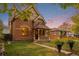 A lovely view of the home showcasing its architectural details and inviting front porch at 2841 N Franklin St, Denver, CO 80205