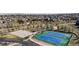 Community tennis and basketball courts in a well-maintained neighborhood at 16392 Spanish Peak Way, Broomfield, CO 80023