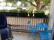 Delightful outdoor balcony with patio furniture and potted plants, perfect for relaxing at 5455 S Dover S St # 102, Littleton, CO 80123