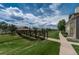Enjoy scenic community views from this home's convenient walking path and bridge at 5455 S Dover S St # 102, Littleton, CO 80123