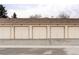 Attached garages provide convenient parking and storage in this residential community at 5455 S Dover S St # 102, Littleton, CO 80123