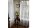Sunlit nook featuring a plant, decorative table, and light-filled window at 5455 S Dover S St # 102, Littleton, CO 80123