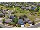 Aerial view of a suburban neighborhood featuring lush greenery and well-maintained homes at 1488 Baguette Dr, Castle Rock, CO 80108