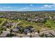 A landscape shot of the houses in the neighborhood and grassland at 1488 Baguette Dr, Castle Rock, CO 80108