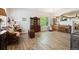 Cozy living room with gorgeous hardwood floors, furniture and large window at 1488 Baguette Dr, Castle Rock, CO 80108