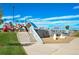 Community playground with colorful play structures, a climbing wall and a soft surface at 1488 Baguette Dr, Castle Rock, CO 80108