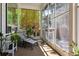 Bright sunroom with lots of light is the perfect relaxation space with nature as the focal point at 1488 Baguette Dr, Castle Rock, CO 80108
