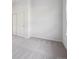 This bedroom offers neutral walls, soft carpeting and a sliding door closet at 485 Interlocken Blvd # 102, Broomfield, CO 80021
