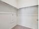 Walk-in closet with mounted shelving and storage at 485 Interlocken Blvd # 102, Broomfield, CO 80021