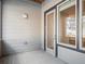 Covered porch with window and view of the interior at 485 Interlocken Blvd # 102, Broomfield, CO 80021