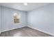 Cozy bedroom with a view from the window and ample electrical outlets at 1963 Hogan Ct, Castle Rock, CO 80109