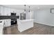 Modern kitchen with stainless steel appliances, a center island, and an open layout at 1963 Hogan Ct, Castle Rock, CO 80109