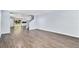 Bright living room area that features modern hard flooring and neutral paint at 1963 Hogan Ct, Castle Rock, CO 80109